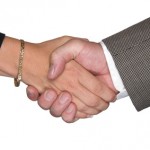 Male and female shaking hands